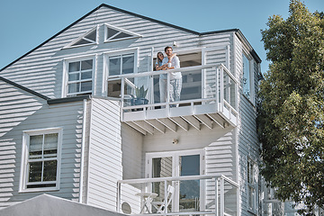 Image showing Balcony, coffee and couple enjoying view on holiday for love, bonding and conversation. Loving, communication and man and woman in love while on vacation for rest and relaxation drinking tea outside