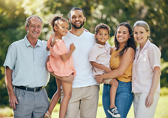 Image showing Portrait, family and park with kids, parents and grandparents bonding in summer, relax and happy in nature. Smile, love and children having fun with interracial, happy family and cheerful in a garden
