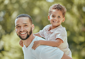 Image showing Dad, piggy back and child fun in nature with father and son bonding with quality time and happiness. Portrait of a happy dad and young kid together in a park with parent care and play with love