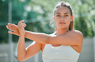 Image showing Portrait of woman, stretching hands and training for lifestyle fitness motivation in park. Young athlete girl, vision wellness and healthy body exercise or cardio muscle warm up in nature outdoors