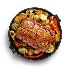 Image showing whole roast pork and vegetables