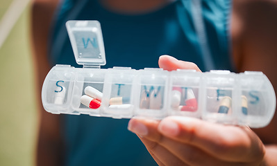 Image showing Hands, medicine and pills container schedule for health, wellness and medication reminder for vitality macro. Self care, management and pharmaceutical plastic case for healthy drugs lifestyle woman.