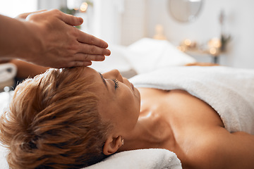 Image showing Spa, black woman and head massage to relax, peaceful and calm for clear mind, wellness and stress relief on table. Senior female, physical therapy and luxury vacation for health, body care and fresh.