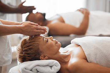 Image showing Woman, head and spa massage of couple at beauty salon, holiday resort and wellness vacation, face cosmetics and peace in Bali. Black woman, luxury facial and relax treatment from skincare therapist