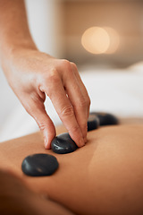 Image showing Hot stone therapy, massage and relax in a luxury spa resort for wellness treatment, relaxation therapy with hand and organic healing. Woman in a beauty salon, natural skincare and body health energy