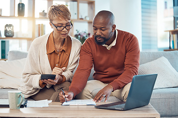 Image showing Documents, laptop and couple with calculator writing, planning or calculate financial budget, savings or bank payment. Mortgage insurance, taxes and black woman and man review accounting finance data