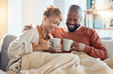 Image showing Mature couple, drinking coffee on couch and laughing funny joke in living room of love, care or easy lifestyle together. Smile black couple relax, lounge or cup of tea in house for happy conversation