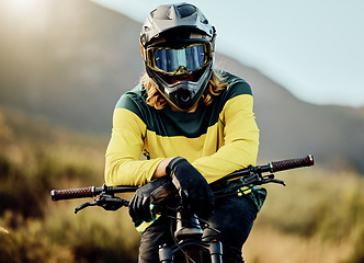 Image showing Dirt bike, bicycle and athlete portrait to ride in competitive cycling competition for adventure. Extreme sport, moto and rider waiting for cycle sport and activity for fitness and health