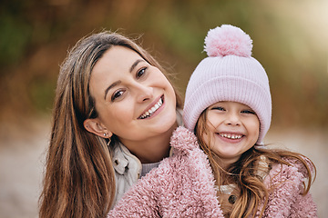 Image showing Nature, love and portrait of mother with child outside on happy family vacation making memories. Happiness, woman and toddler girl smile and relax in park spending bonding time together in garden.