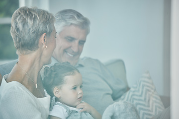 Image showing Grandparents, girl and hug with family relax, love and care on lounge sofa in home. Smile, play and happy children, senior grandma and elderly grandpa bond together for quality time on a house couch