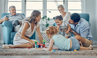 Image showing Family, grandparents and children play on carpet together and relax for learning, teaching and home language development. Happy family, mother and father with kids games or puzzle for mindset growth