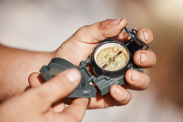 Image showing Hiking man, hands or pocket compass in travel location, camping ground direction or destination arrow map. Zoom, navigation device or magnetic north guide for nature camper in countryside environment