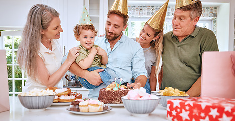 Image showing Children, family and birthday with parents and grandparents celebrating the party of a boy together in the home. Cake, celebration and event with a mother, father and relatives celebrating their son