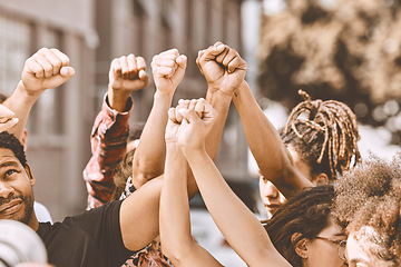 Image showing Justice, freedom and hands of people in protest city with community for support, change and world peace. War, government and global power with fist of crowd for activism fight, society or revolution