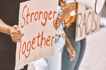 Image showing Protest, sign and equality with a group of people holding cardboard during a rally or march for freedom. Street, community and justice with a crowd fighting for human rights or a politics campaign