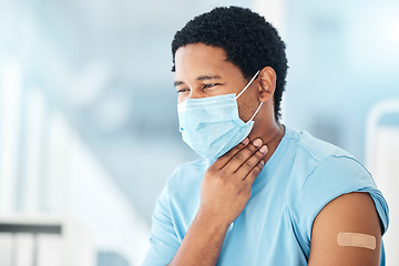 Image showing Man, covid face mask and sore throat in hospital with vaccine plaster, bacteria infection or healthcare crisis. Black person, pain and sick with covid 19 virus in medical clinic, pharmacy or lockdown
