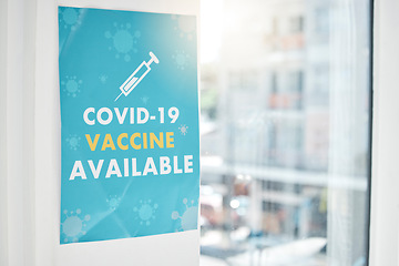 Image showing Poster, covid and vaccine with a sign on a wall in an empty hospital or clinic for healthcare and medication. Advert, corona virus and vaccination with a message in a health center for treatment