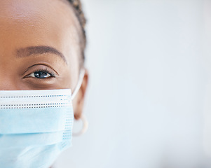 Image showing Covid, face mask and portrait of doctor working in hospital with safety, compliance and vision in eye for health, healing and innovation. Black woman in healthcare and medical field during covid 19