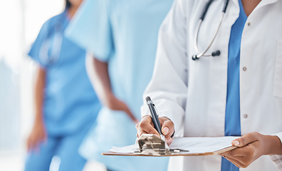 Image showing Hands, documents and doctor writing at hospital for compliance, information and insurance. Hand, paper and healthcare woman filling form, clipboard and prescription while planning appointment