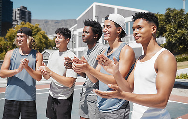Image showing Basketball team, friends and applause of men for goal, support or motivation on basketball court. Clapping hands, fitness or teamwork of sports group excited for success in exercise match or training