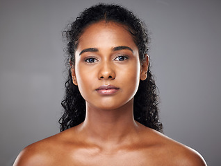 Image showing Face, beauty and skincare of a woman from India with glowing, wellness and skin health. Portrait of a young Indian person after a cosmetic, dermatology of glowing body treatment looking radiant