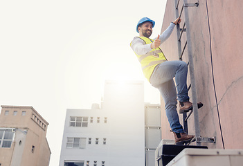 Image showing Engineer, ladder and thumbs up with man climbing on a building during construction inspection. Agree, approve and thumbsup with builder working on building architecture for maintenance and repair