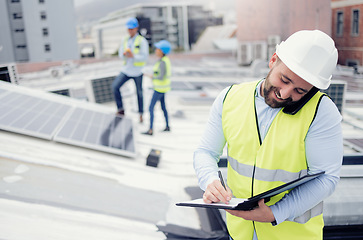 Image showing Construction, phone call and businessman writing checklist during building inspection on the roof. Engineer, architect and builder on mobile communication outside on an industrial site with notes