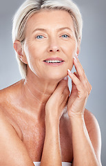 Image showing Beauty, skin and skincare with woman in antiaging portrait, face treatment and natural cosmetics with grey studio background. Face, facial and cosmetics, mature model with wellness and healthy glow.