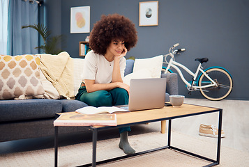 Image showing Laptop, education and learning with a black woman student watching an online video while studying in a living room. Computer, study and homework with a female university or college pupil in her home