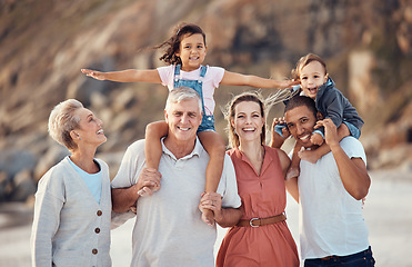 Image showing Family beach portrait, child on shoulder and dad, mom and multicultural grandparents together on vacation. Happy big family, generation smile with happiness outdoor in summer holiday for diversity