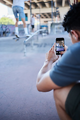 Image showing Phone, skateboard and man recording video in street, city or outdoors. Tech, skater and male record friends skating or training on 5g mobile smartphone for social media, internet or web post online.