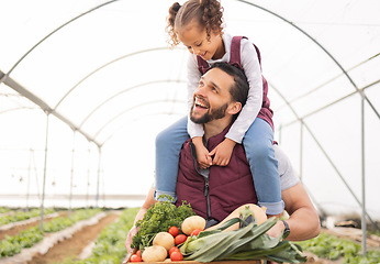 Image showing Family, agriculture and farming with father and child together in a greenhouse for sustainability, growth and harvesting vegetables. Man and girl farmer together for bonding and learning on agro farm