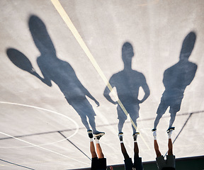 Image showing Basketball, shoes and silhouette of team upside down on basketball court training for game or competition. Fitness, sports and shadow of basketball players ready for exercise, workout or practice.