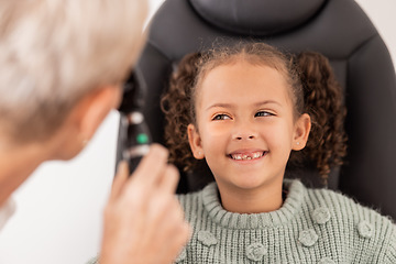 Image showing Happy, test and child with eye doctor for eyesight, vision or retina testing at an optometrist appointment. Smile, consulting and young girl with optician for an eye exam or expert eye care treatment