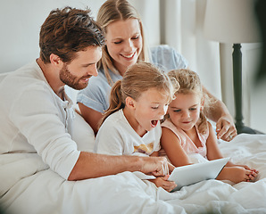 Image showing Parents, kids and tablet learning in bedroom, games and watching cartoons on internet, online and relax at home. Happy family of mom, dad and excited children, digital fun and educational app on tech