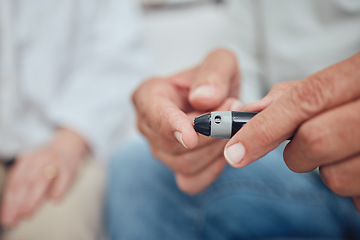 Image showing Man, fingers or diabetes test on glucometer pen in house living room, home or hospital in medical healthcare or insurance check. Zoom, hands or diabetic patient in blood glucose or insulin management