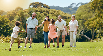 Image showing Big family, nature park and happy to play with children running on grass with senior grandparents, mom and dad smile in summer sunshine. Fun mother, father and open arms to hug kids outdoors together