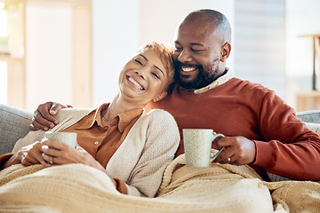 Image showing Love, black couple and coffee with blanket, being happy or smile together for bonding, loving and in lounge. Retirement, romance and senior man with mature woman for quality time, talking and connect