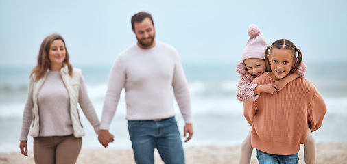 Image showing Family, beach and love, travel and adventure with parents holding hands and kids piggy back, walking by the ocean. Together out in nature, sea and mother, father and children have fun bonding.