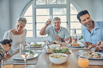 Image showing Big family, lunch and happy celebration toast with grandparents, parents and kid together in home. Food, communication and cheers of grandfather at dining table with young and senior people.