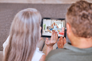 Image showing Senior couple tablet, video call happy birthday to children and communication app on living room sofa. Elderly man, woman and digital mobile technology for internet video conference to congrats kids