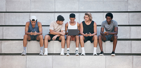 Image showing Laptop, phone and diversity friends with technology for online, internet or web search for digital news, blog or social network app. Mobile connection, concrete steps and group of social media user