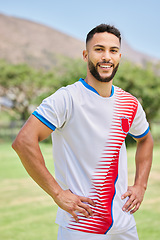 Image showing Fitness, sports and portrait of man on soccer field for training, workout and health. Wellness, exercise and football with soccer player and smile for match, cardio and games competition lifestyle