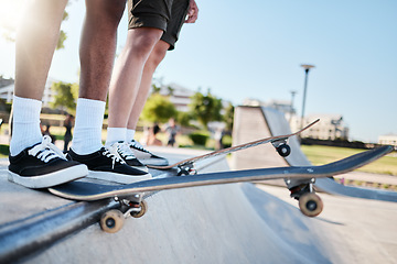 Image showing Fitness, shoes and skateboard friends training at skateboard for health, exercise and hobby in summer. Feet, balance and men stepping for halfpipe, skating and prepare body for physical performance