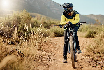 Image showing Mountain bike, sports and nature man in fitness adventure, travel and journey in Australia dirt path for marathon, race or training. Cycling man on bicycle with safety helmet gear for outdoor sport
