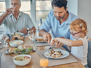 Image showing Restaurant, daughter and father with cutting, food or meat on table for learning, teaching and help. Dad, girl and lunch together with fork, knife and plate and helping kid with meal with family