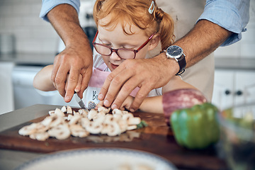 Image showing Kid, dad and cooking, cutting board and food in kitchen, family home or house for childhood fun, learning and development. Parent helping little girl chop mushroom vegetables for lunch or dinner meal