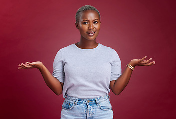 Image showing Confused, question and why black woman on studio red background, body language and facial gesture for risk decision, shrug and reaction. Uncertainty, unsure and frustrated model, doubt and confusion