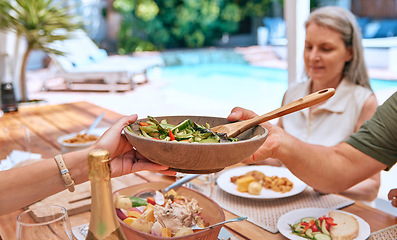 Image showing Hands, food and family relax on a patio, eating, bond and sharing a meal at a table together. Friends, salad and senior woman calm, content and enjoy healthy lunch with hungry group on a terrace