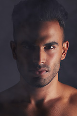 Image showing Studio, beauty and sexy portrait of man from India, serious face and topless with dark art black background. Fitness, wellness and skincare for health or body care, sensual Indian model and sexy man.